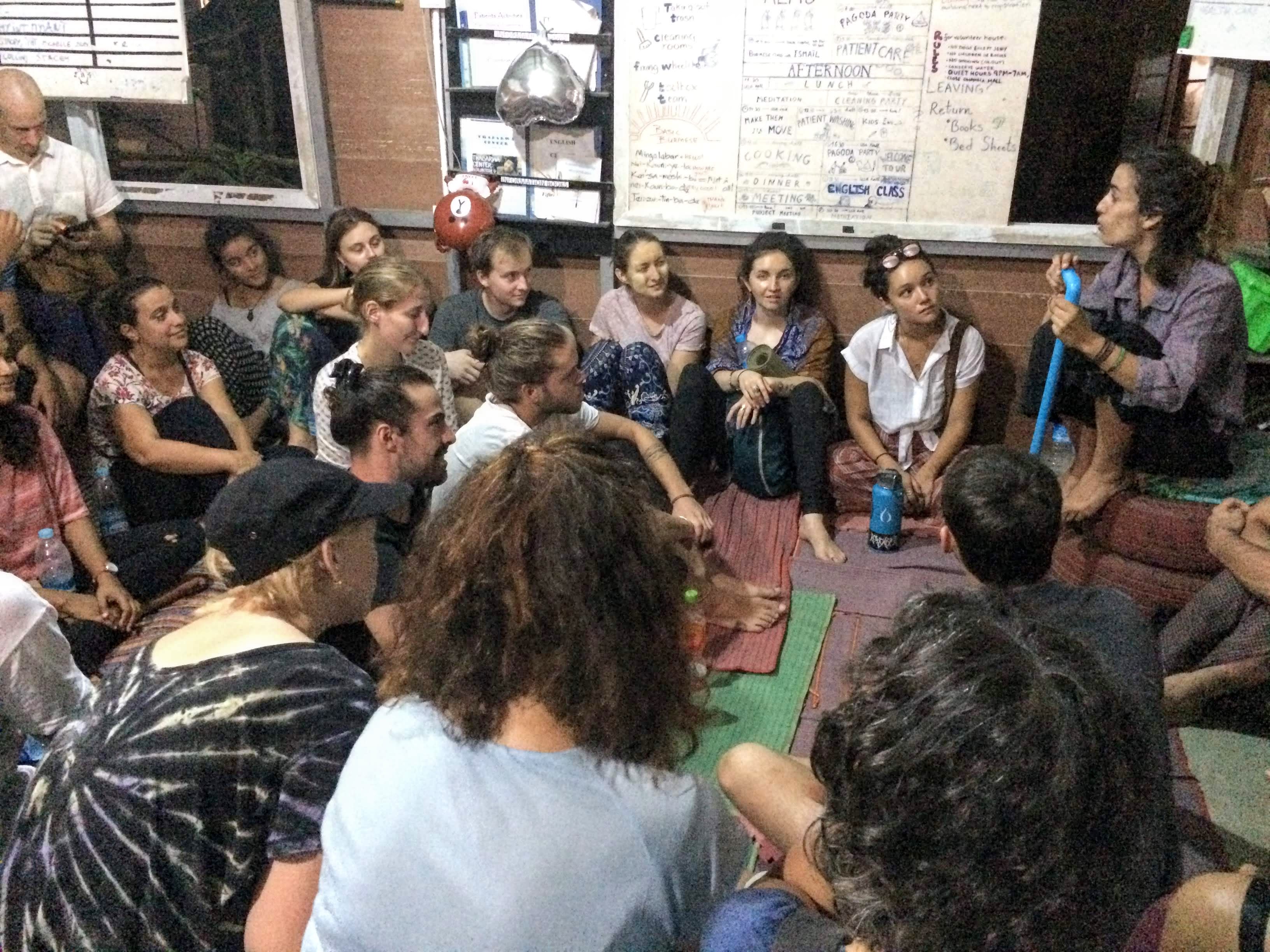 The international volunteers met at the end of the day to delegate the work for tomorrow.