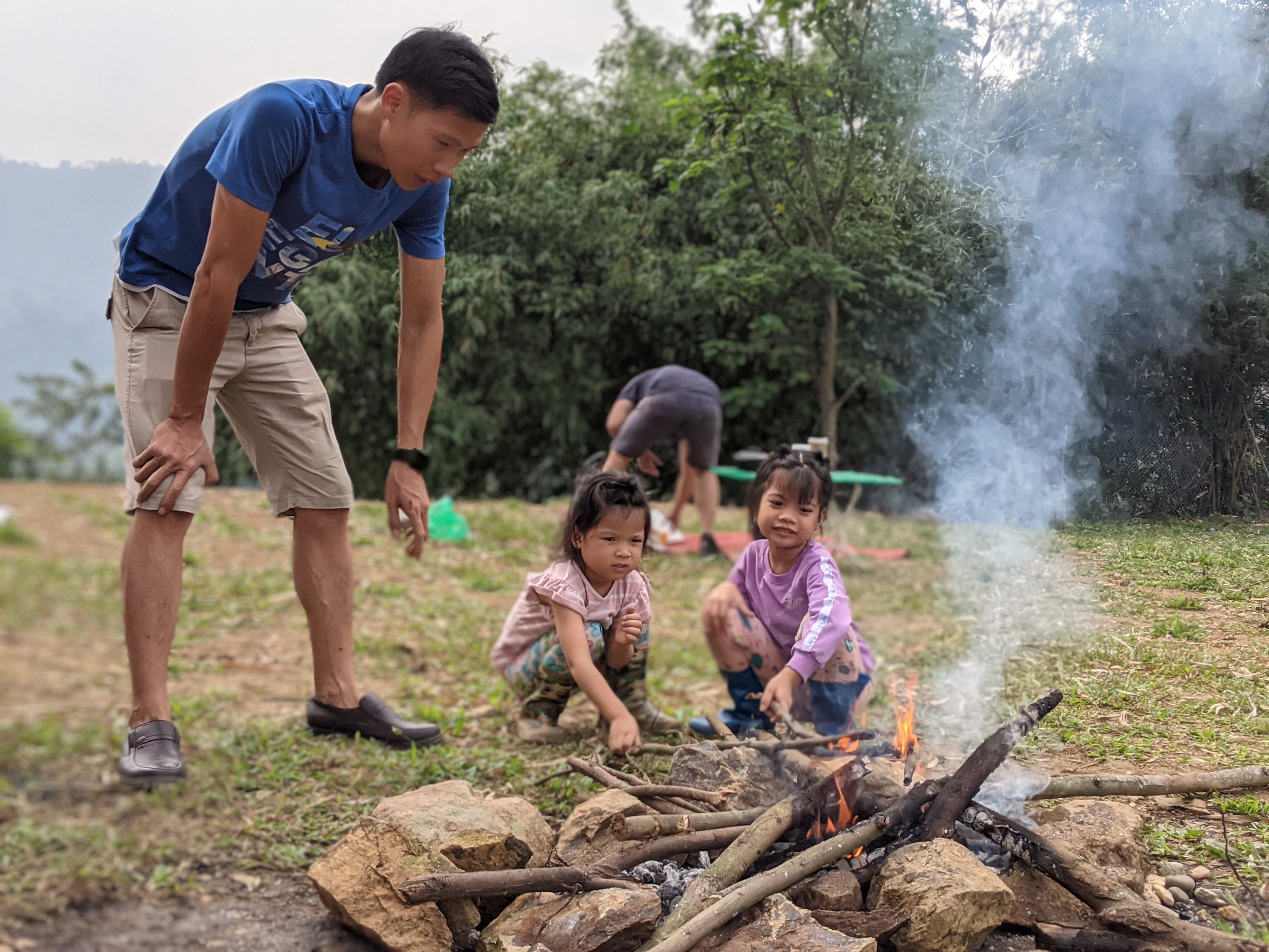 Barbecue grilling with parents during the visit to Spring Hill School every last Friday of the month in Quoc Oai.